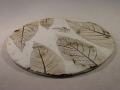 ceramiczna podstawka z liściem